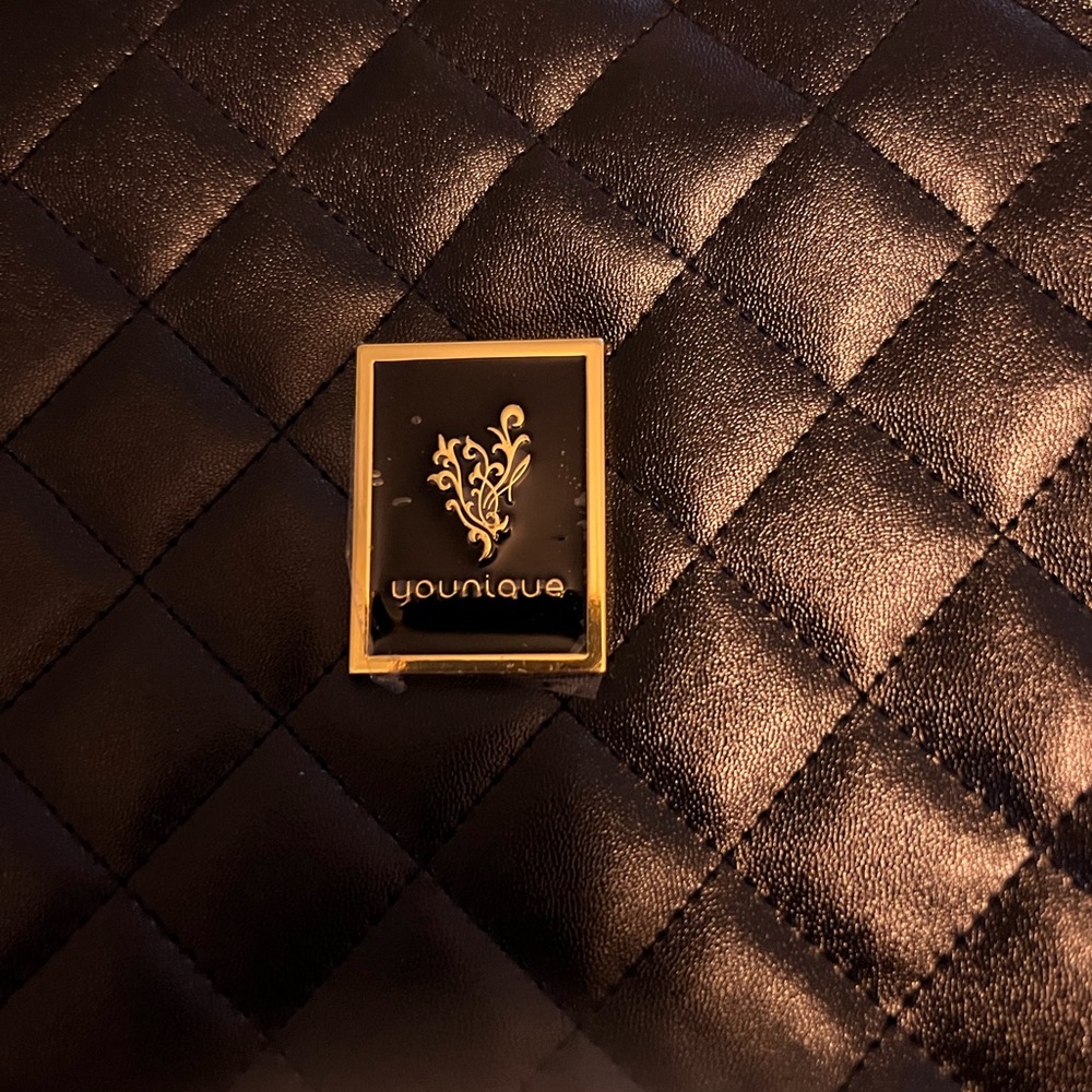Younique Black and Gold Emblem Pin